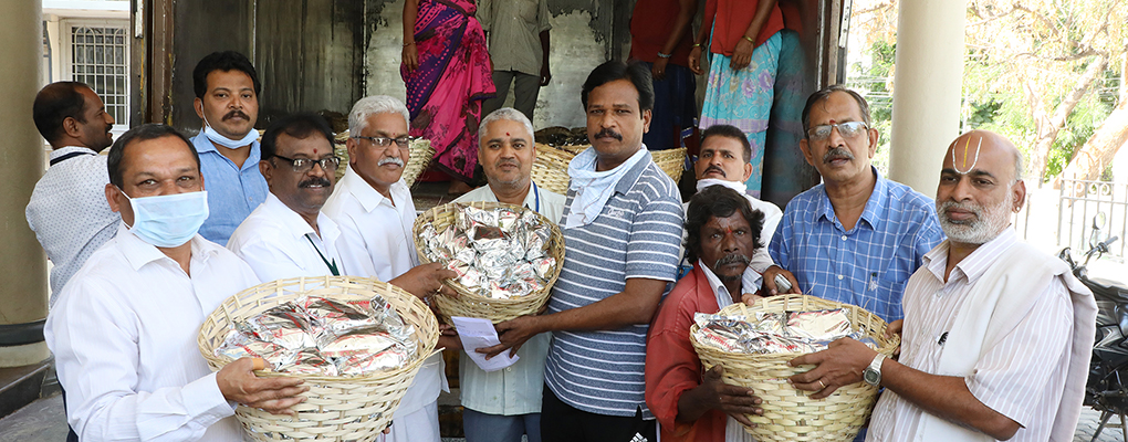 DISTRIBUTION OF FOOD PACKETSWATER MARK