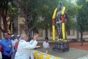 eo paying floral tributes to statue of Saint Thyagaraja