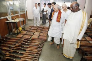 chairman inspecting copper work of ananda nilayam anantha swarna mayam