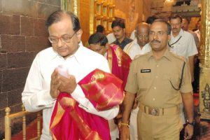 union home minister coming out of the temple