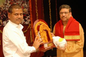 Sri Nagi Reddy felicitating Sri IV Subba Rao