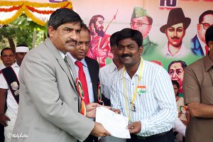 eo ttd presenting silver dollor and certificate of apprecitation to Sri C Muni Prasad Sr Asst JEO Office tml