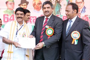 EO presenting Certification of appreciation to Sri Chinnamgari Ramana DyEO Temple