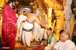chief priest blessing the cm
