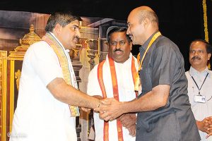 EO Presentating Medal to AVSO Sri Koteswara Babu
