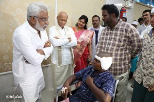 CHAIRMAN INTERACTING WITH COCHLEAR IMPLANT OPERATION CHILD3